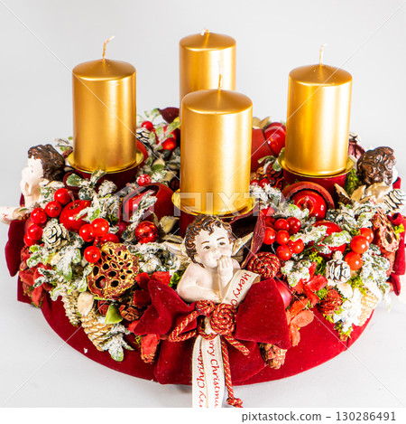 Christmas table composition. Beautiful decoration. Christmas trees, candles, stars, lights and elegant accessories. Merry Christmas and Happy Holidays, Template. 130286491
