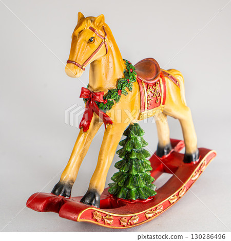 Christmas table composition. Beautiful decoration. Christmas trees, candles, stars, lights and elegant accessories. Merry Christmas and Happy Holidays, Template. 130286496