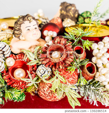 Christmas table composition. Beautiful decoration. Christmas trees, candles, stars, lights and elegant accessories. Merry Christmas and Happy Holidays, Template. 130286514
