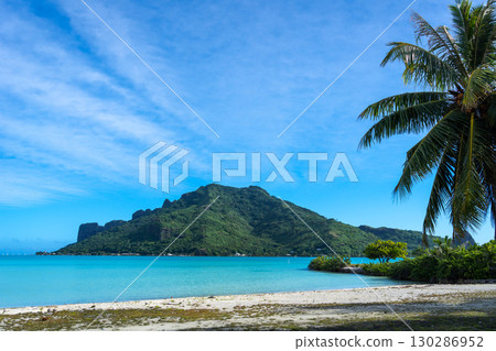 Scenic View of Maupiti Island from a Tropical Beach in French Polynesia Scenic View of Maupiti Island from a Tropical Beach in French Polynesia 130286952