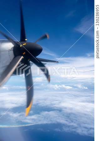 Aerial view of the Pacific Ocean with a spinning propeller 130286955