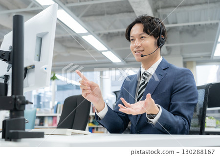 Operator working in the office Operator working in the office 130288167