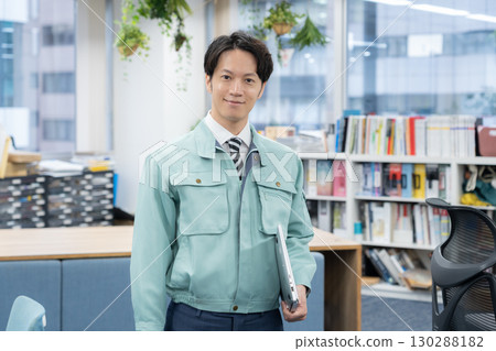Young engineer working in the office Young engineer working in the office 130288182