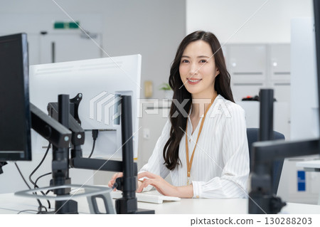 Young female engineer in office casual wear 130288203