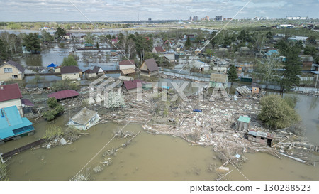 Floods and cyclone, global warming. Climate change,natural disasters the tsunami of nature.The apocalypse, catastrophes.Storms and destruction.The remnants of human life are floating in dirty water Floods and cyclone, global warming. Climate change,natural disasters the tsunami of nature.The apocalypse, catastrophes.Storms and destruction.The remnants of human life are floating in dirty water 130288523