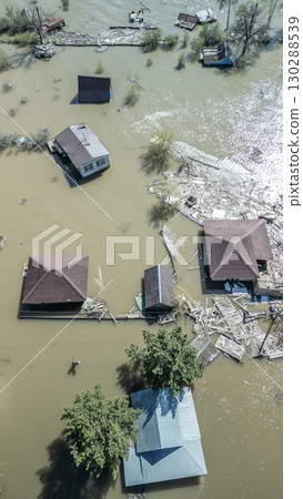 Floods and cyclone, global warming. Climate change,natural disasters the tsunami of nature.The apocalypse, catastrophes.Storms and destruction.The remnants of human life are floating in dirty water Floods and cyclone, global warming. Climate change,natural disasters the tsunami of nature.The apocalypse, catastrophes.Storms and destruction.The remnants of human life are floating in dirty water 130288539