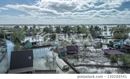 Floods and cyclone, global warming. Climate change,natural disasters the tsunami of nature.The apocalypse, catastrophes.Storms and destruction.The remnants of human life are floating in dirty water Floods and cyclone, global warming. Climate change,natural disasters the tsunami of nature.The apocalypse, catastrophes.Storms and destruction.The remnants of human life are floating in dirty water 130288541