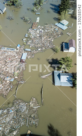 Floods and cyclone, global warming. Climate change,natural disasters the tsunami of nature.The apocalypse, catastrophes.Storms and destruction.The remnants of human life are floating in dirty water Floods and cyclone, global warming. Climate change,natural disasters the tsunami of nature.The apocalypse, catastrophes.Storms and destruction.The remnants of human life are floating in dirty water 130288542