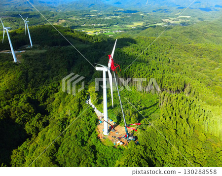 Aerial view of wind power generation wind turbine construction work in Esashi Town, Hokkaido in autumn Aerial view of wind power generation wind turbine construction work in Esashi Town, Hokkaido in autumn 130288558