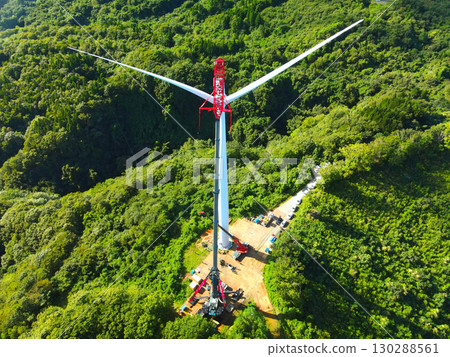 Aerial view of wind power generation wind turbine construction work in Esashi Town, Hokkaido in autumn 130288561