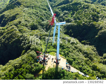 Aerial view of wind power generation wind turbine construction work in Esashi Town, Hokkaido in autumn 130288562