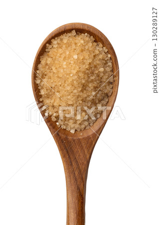Brown sugar granules in wooden spoon, natural sweetener isolated on transparent background, top view 130289127