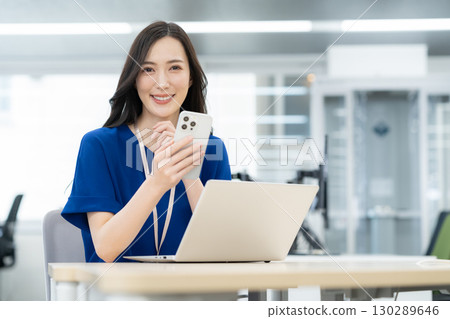 Young female engineer in office casual wear 130289646