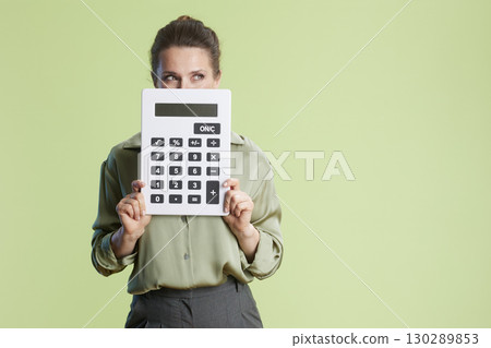 Playful Accountant: Eyes above the Calculator. Playful Accountant: Eyes above the Calculator. 130289853