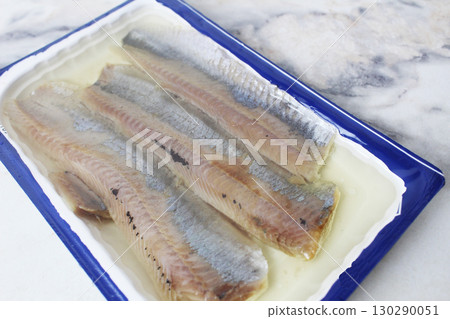 close-up of pieces of herring. Salting fish, herring 130290051