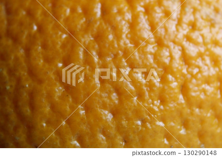 orange peel fruit close-up. Macro photo of eating orange fruit orange peel fruit close-up. Macro photo of eating orange fruit 130290148