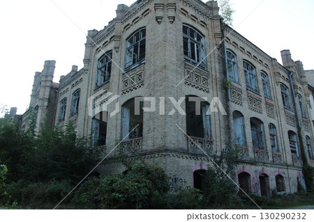 a dilapidated building. The consequence of the war. Forced migration a dilapidated building. The consequence of the war. Forced migration 130290232