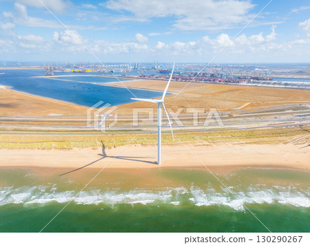 Wind turbine on the seashore. Renewable and natural energy sources. Green energy. 130290267
