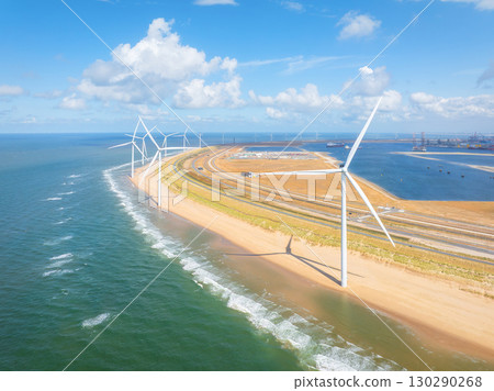Wind turbine on the seashore. Renewable and natural energy sources. Green energy. 130290268