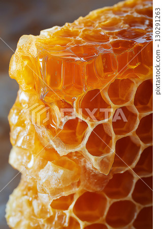 Golden Honey Comb Textures in Natural Sweet Organic Amber Nectar and Fresh Sticky Hexagons 130291263