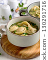 Warm Tortellini Soup Delight. 130291716
