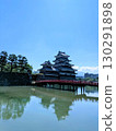 National Treasure Matsumoto Castle reflected on the surface of the water 130291898