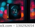 Modern Smart Thermostat Display Showing 72 With Neon City Bokeh 130292654
