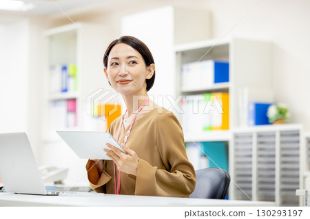 Business woman with tablet Business woman with tablet 130293197