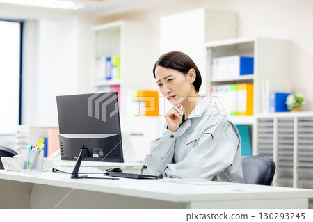 Working women in work clothes Working women in work clothes 130293245