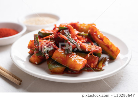 Korean kimchi cucumber on white plate, Korean side dish, Homemade food 130293647