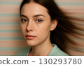Calm Woman Portrait With Soft Motion Lines Background 130293780