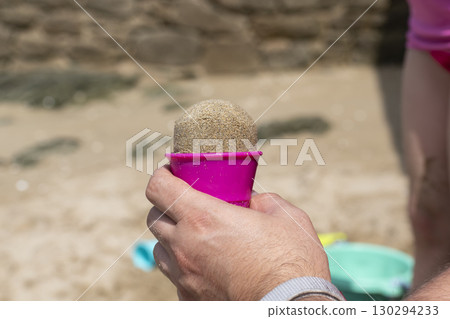 Child playing on a beach, good activity and sport for health and mental health 130294233