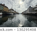 Scenic summer view of color buildings and boats of Nyhavn in Copenhagen, Denmark 130295408