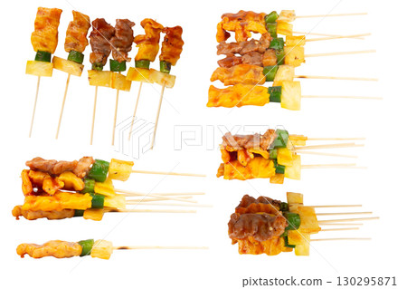 Grilled Barbecue Skewers on Plate with White Background 130295871