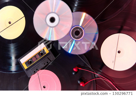 Vinyl records with cassette tapes and compact discs 130296771