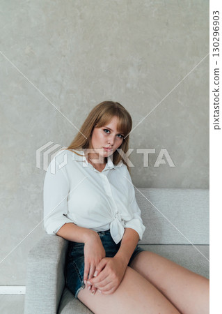 Young Fashion Woman In White Shirt And Black Pants Young Fashion Woman In White Shirt And Black Pants 130296903