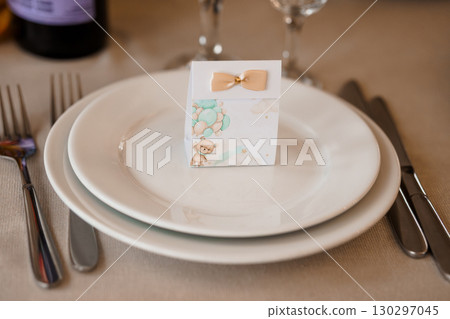 Baby Shower Favor Box with Teddy Bear and Balloon, Pastel Colors, Elegant Table Setting, Wedding, Party Decoration, Soft Focus, Cute Theme. 130297045