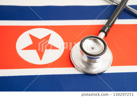 Stethoscope on North Korea flag, business and finance. Stethoscope on North Korea flag, business and finance. 130297251
