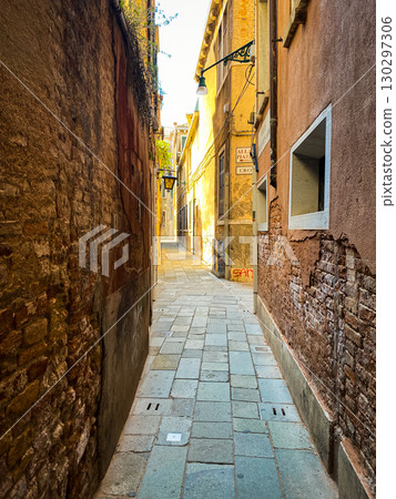 Venice, Italy, a narrow street in the old town 130297306