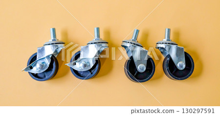 Spare part of cart wheel on color background. Spare part of cart wheel on color background. 130297591