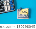 A dollars on a clip with note paper and calculator  ,Finance and business for Tax concept. 130298045