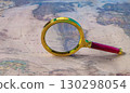 A magnifying glass on old map background. 130298054