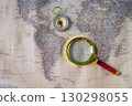 A magnifying glass on old map background. 130298055