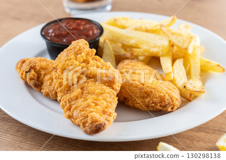 Crispy fried chicken tenders 130298138