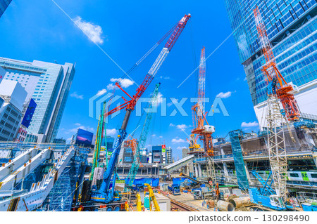 Tokyo cityscape, Japan, September 1st. Huge heavy machinery such as crawler cranes and pile drivers are lined up... = Shibuya 130298490