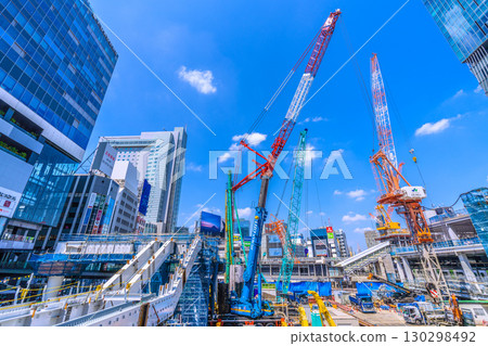 Tokyo cityscape, Japan, September 1st. Huge heavy machinery such as crawler cranes and pile drivers are lined up... = Shibuya 130298492