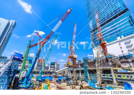 Tokyo cityscape, Japan, September 1st. Huge heavy machinery such as crawler cranes and pile drivers are lined up... = Shibuya 130298500