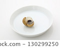 Longan pulp and seeds served on a plate 130299250