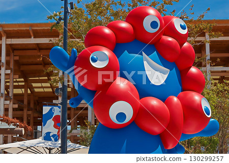 Official mascots welcoming visitors to the Kansai Expo 2025 in Osaka in front of the West Gate 130299257
