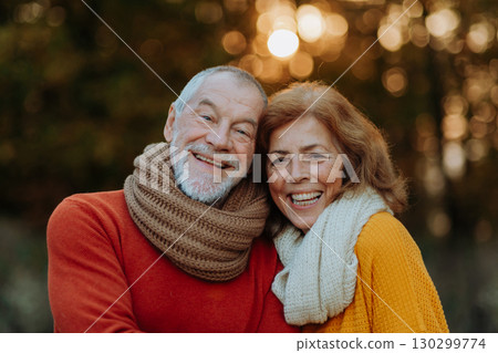 Portrait of senior couple in autumn nature. Portrait of senior couple in autumn nature. 130299774